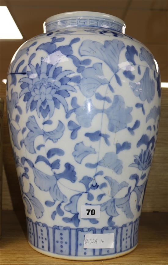 A modern Chinese blue and white vase (a.f.) and a marble topped table (2)